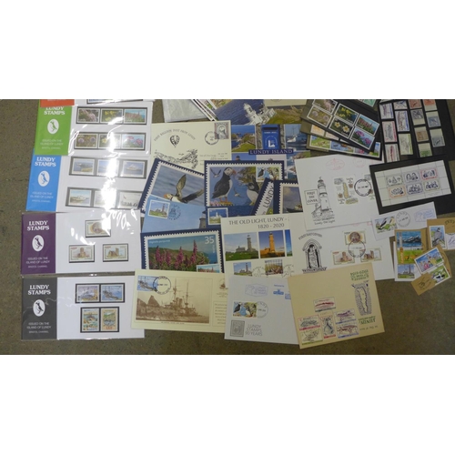 958 - Stamps; Lundy Island, 70 unmounted stamps and two mini sheets on black cards, 8 presentation packs, ... 