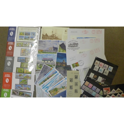 958 - Stamps; Lundy Island, 70 unmounted stamps and two mini sheets on black cards, 8 presentation packs, ... 