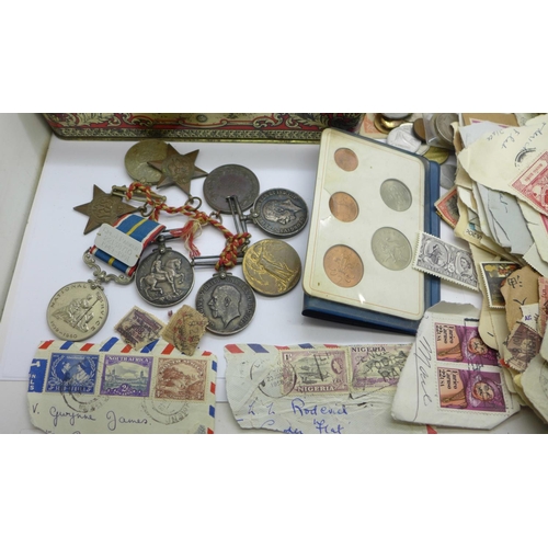 967 - A pair of WWI medals, two WWI British War medals, postal interest Air Mail, coins and banknotes, pai... 