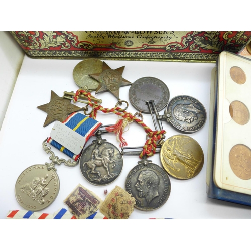 967 - A pair of WWI medals, two WWI British War medals, postal interest Air Mail, coins and banknotes, pai... 