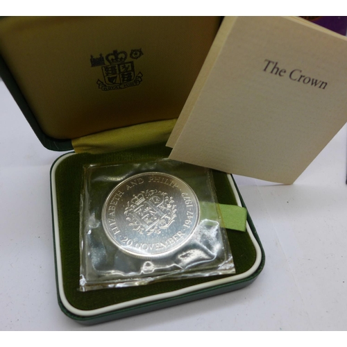 974 - Two 1970 coin sets, one 1967 coin set, a Royal Mint 1983 coin set and a 1972 Silver Wedding Crown