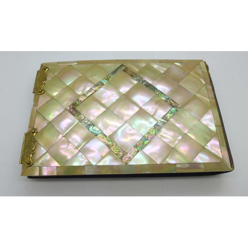 979 - A late Victorian photograph album with mother of pearl and abalone cover, 23.5cm x 15cm, (some mothe... 