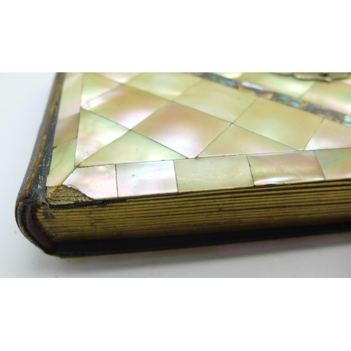 979 - A late Victorian photograph album with mother of pearl and abalone cover, 23.5cm x 15cm, (some mothe... 