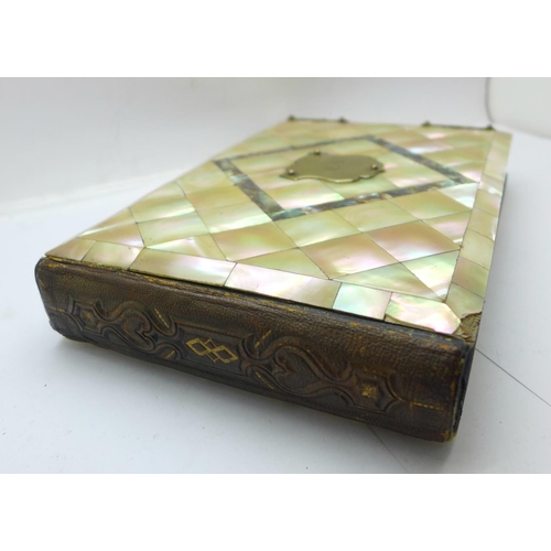 979 - A late Victorian photograph album with mother of pearl and abalone cover, 23.5cm x 15cm, (some mothe... 