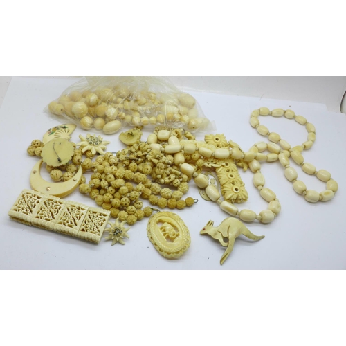 998 - A collection of ivory, bone and carved jewellery, etc.