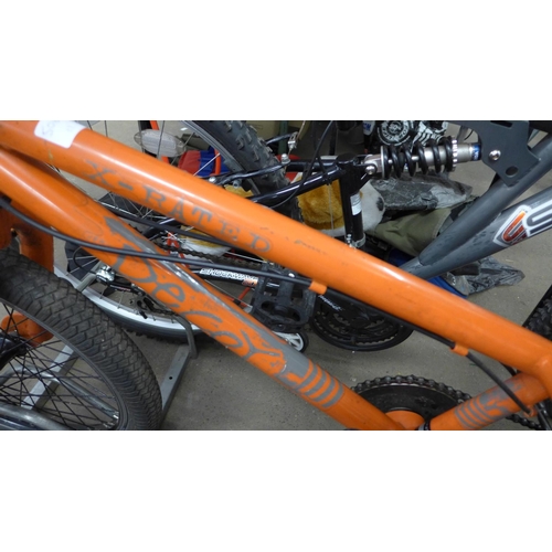 2321 - X-Rated Decoy orange BMX with stunt pegs