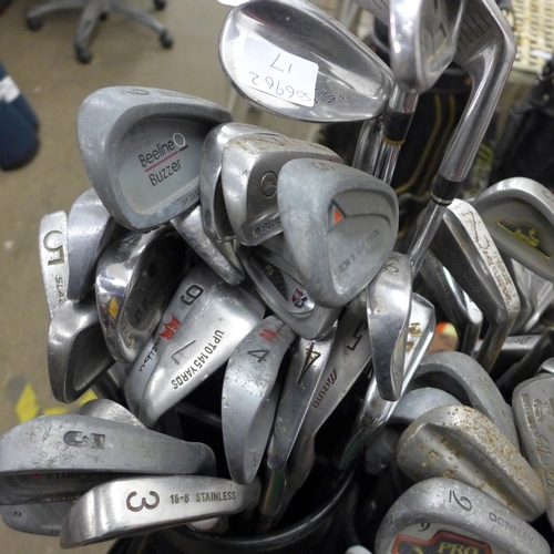 2342 - 4 Bags of various golf irons & woods inc. Donnay, Dunlop, Daytona, Penn, etc.