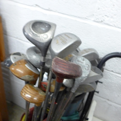 2342 - 4 Bags of various golf irons & woods inc. Donnay, Dunlop, Daytona, Penn, etc.