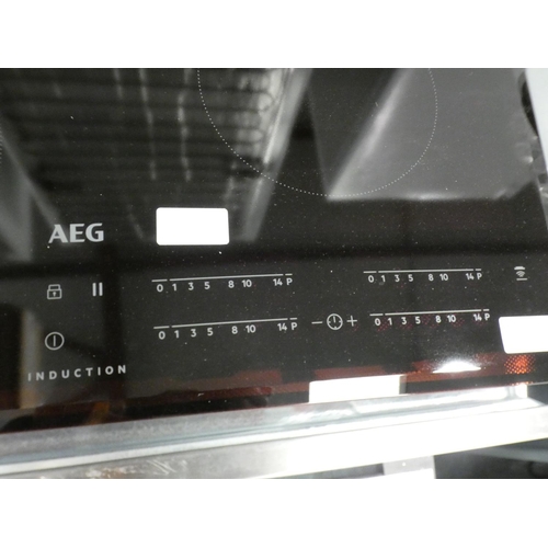 3107 - AEG H40xW745xD510 Induction Hob - model no.:- HGB75420YM, RRP £399 inc. VAT * This lot is subject to... 