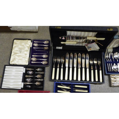 1251 - A collection of plated cutlery including some with silver ferrules **PLEASE NOTE THIS LOT IS NOT ELI... 