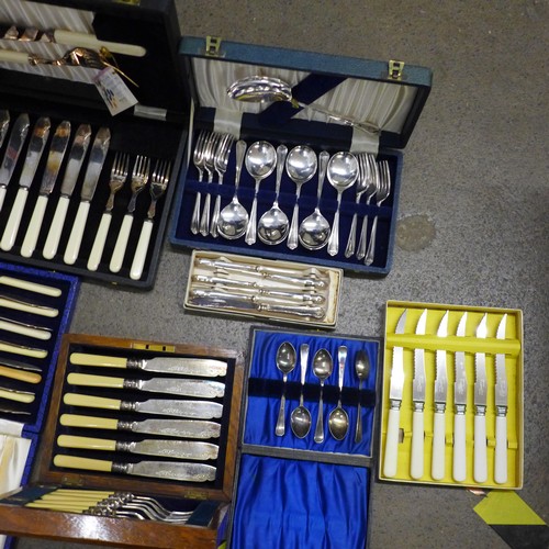 1251 - A collection of plated cutlery including some with silver ferrules **PLEASE NOTE THIS LOT IS NOT ELI... 