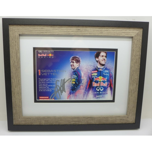 1299 - A framed signed photograph of triple Formula 1 World Champion Sebastian Vettel