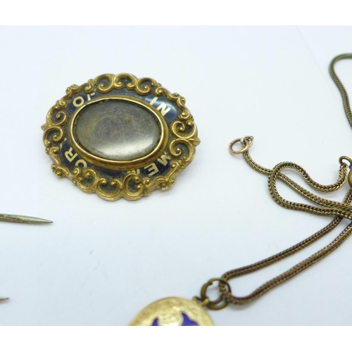 1122 - A collection of jewellery including a mourning brooch with inscription, a yellow metal and enamel pe... 
