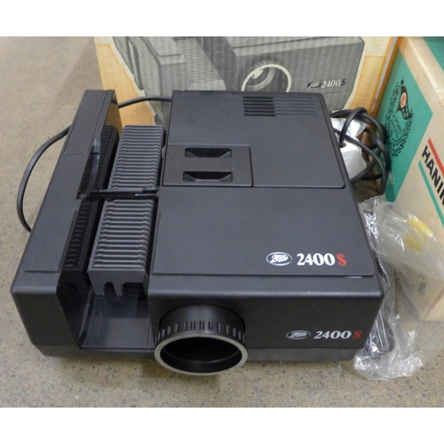 1199 - A Hanimex Rondette 35mm slide projector, a Boots 2400S slide projector and screen **PLEASE NOTE THIS... 