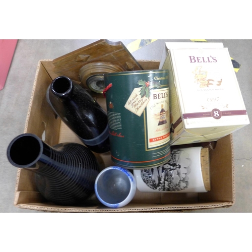 1209 - Four Bell's Whisky decanters, lacking contents, three glass vases, a storage jar and barometer **PLE... 