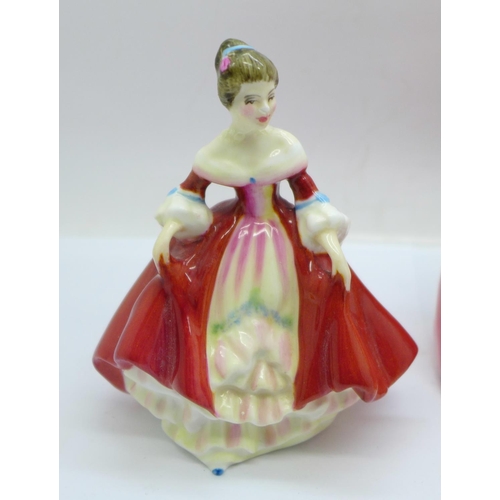 653 - Two Royal Doulton figures; The Bedtime Story HN2059 and Southern Belle HN3174, both a/f (heads reglu... 