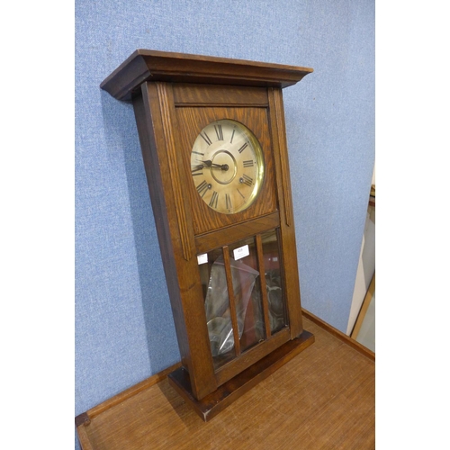 459 - A WML Gilbert Winsted oak wall clock