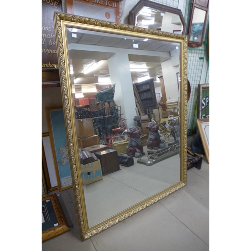 61 - A large gilt framed mirror, 132 x 102cms