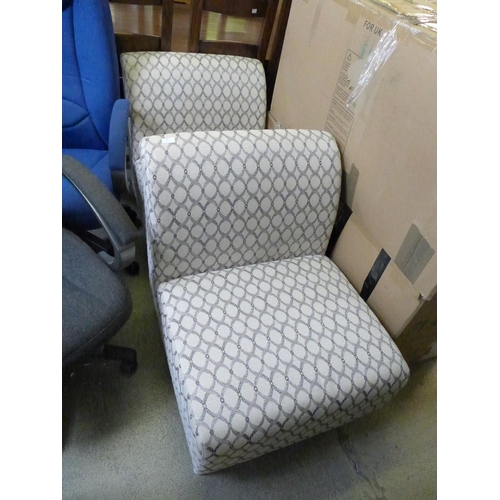 1754 - A pair of patterned upholstered lounge chairs