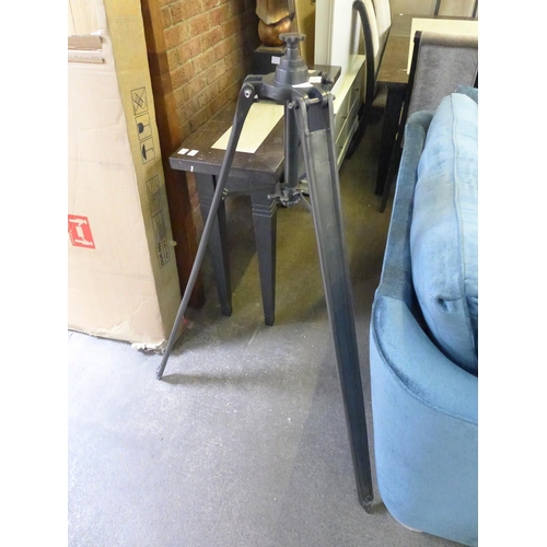 1767 - A metal tripod stand * This lot is subject to VAT