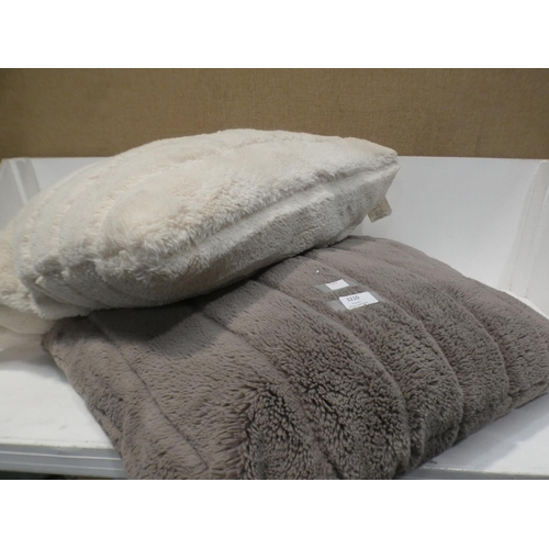 3210 - Two Mixed Faux Fur Cushions  (220-59) * This lot is subject to VAT