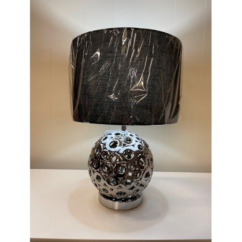 1409 - A Phillipa silver cut out globe lamp with black shade, 47cms (30651C33)