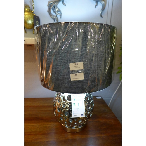 1409 - A Phillipa silver cut out globe lamp with black shade, 47cms (30651C33)