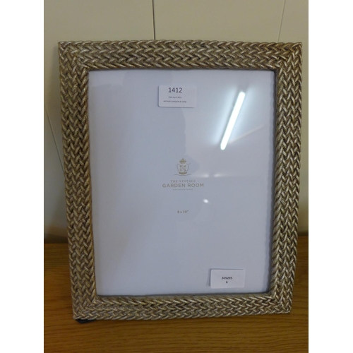 1410 - A silver plaited photograph frame, 8 x 10