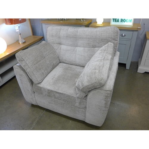 1511 - A taupe upholstered armchair