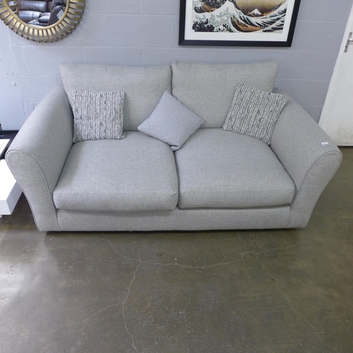 1536 - A grey upholstered three seater sofa