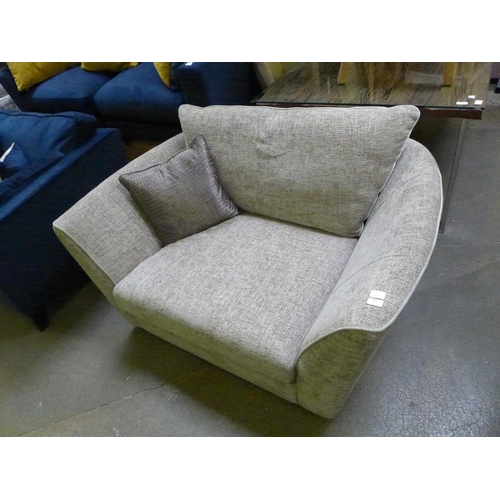 1550 - A biscuit upholstered loveseat