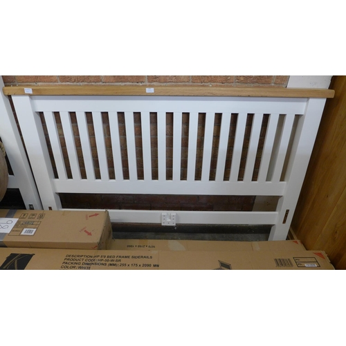 1567 - An oak and white kingsize bed frame * this lot is subject to VAT Boxed unchecked.