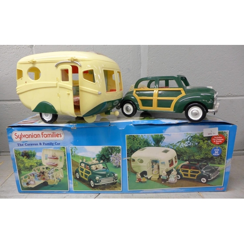 1176 - A Sylvanian Families Caravan and Family Car, boxed