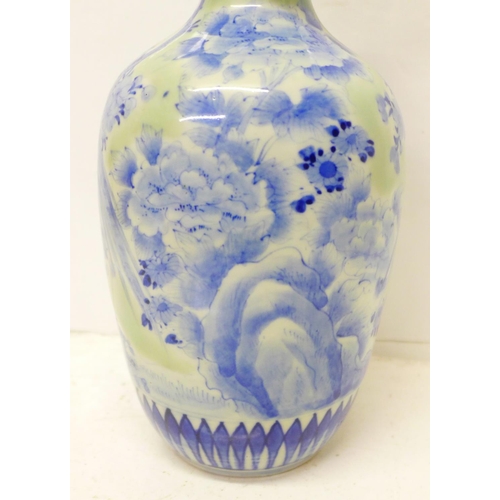 601 - A 19th Century Chinese blue and white vase, small chip to rim, 25cm