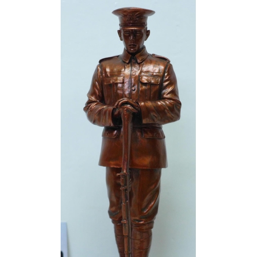 606 - A Danbury Mint For the Fallen - World War I Centenary 1914-18 one bronzed resin sculpture set on woo... 