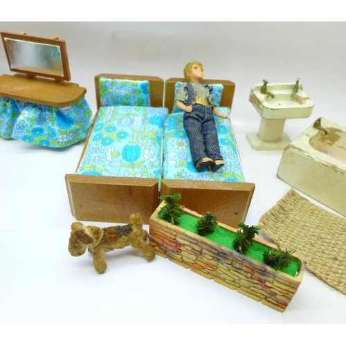 659 - A collection of 1960's/70's dolls house furniture and a doll