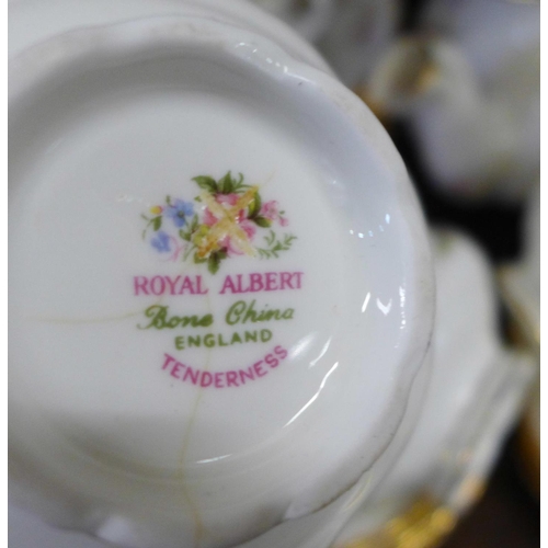 671 - A Royal Albert Tenderness six setting tea set with cereal bowls, cream and sugar, cup a/f and some s... 