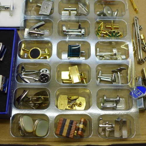 683 - A collection of cufflinks and tie pins