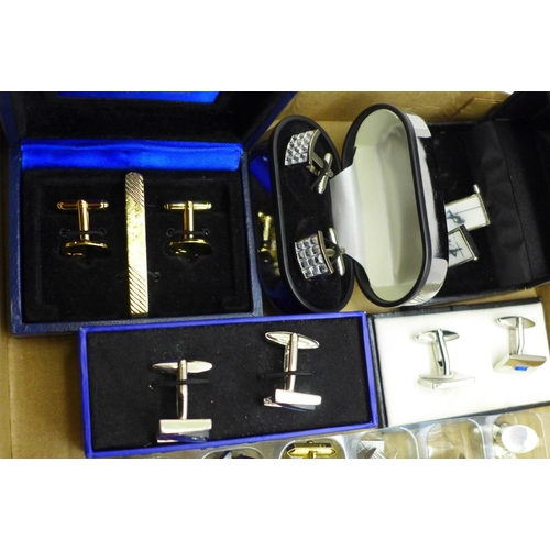 683 - A collection of cufflinks and tie pins