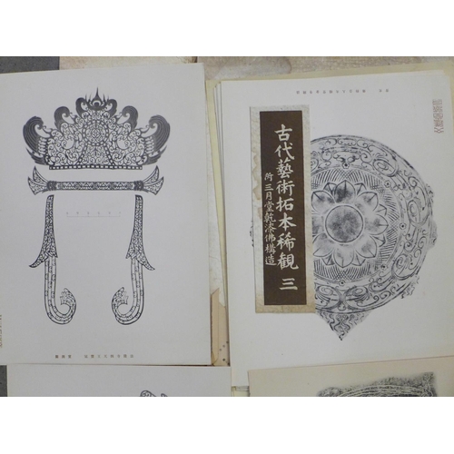 689 - A Japanese folio of prints, rubbings and designs, etc.