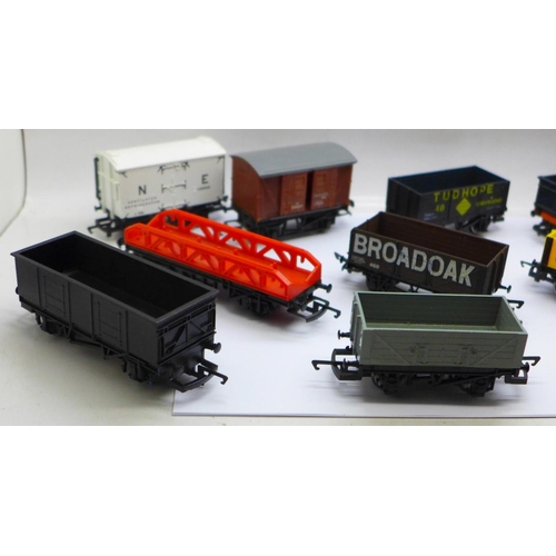 690 - Twelve OO gauge railway wagons including Hornby