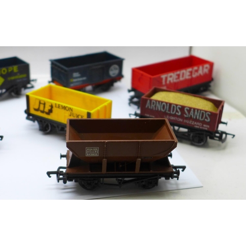 690 - Twelve OO gauge railway wagons including Hornby