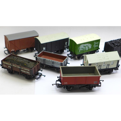 694 - Twelve OO gauge railway wagons including Hornby