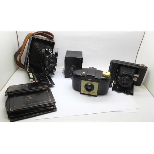 716 - A Voitlander camera with Compur shutter and seven plates; Anastigmat Lukos II, cased, Kodak Brownie ... 