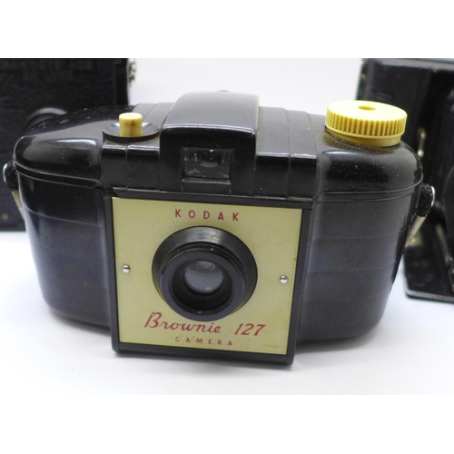 716 - A Voitlander camera with Compur shutter and seven plates; Anastigmat Lukos II, cased, Kodak Brownie ... 