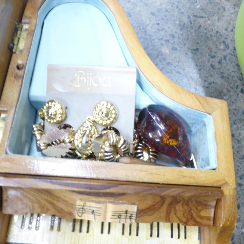 729 - Costume jewellery, fans and jewellery boxes