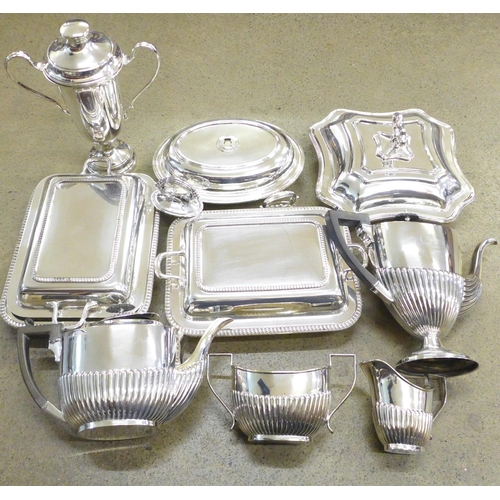 731 - Plated items; entree dishes, trophies, three piece plated tea service, etc.