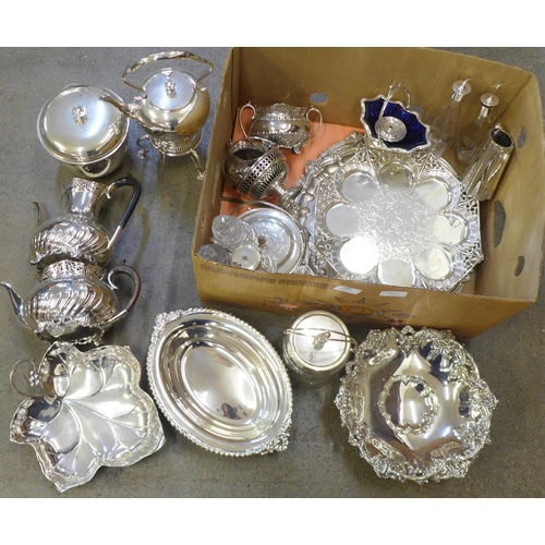 738 - A box of silver plate; spirit kettle, ice bucket, oil pourers, tea service, trays, salvers, etc.