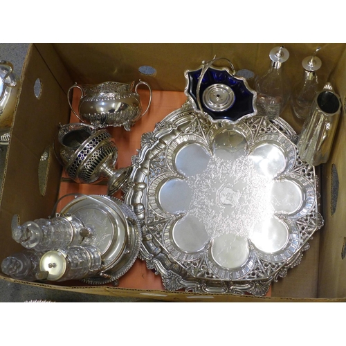 738 - A box of silver plate; spirit kettle, ice bucket, oil pourers, tea service, trays, salvers, etc.