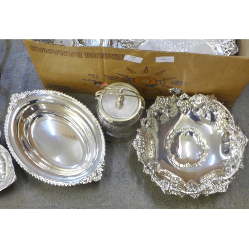 738 - A box of silver plate; spirit kettle, ice bucket, oil pourers, tea service, trays, salvers, etc.